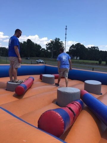Used 4 man inflatable joust arena with pedestals and poles for sale in NC